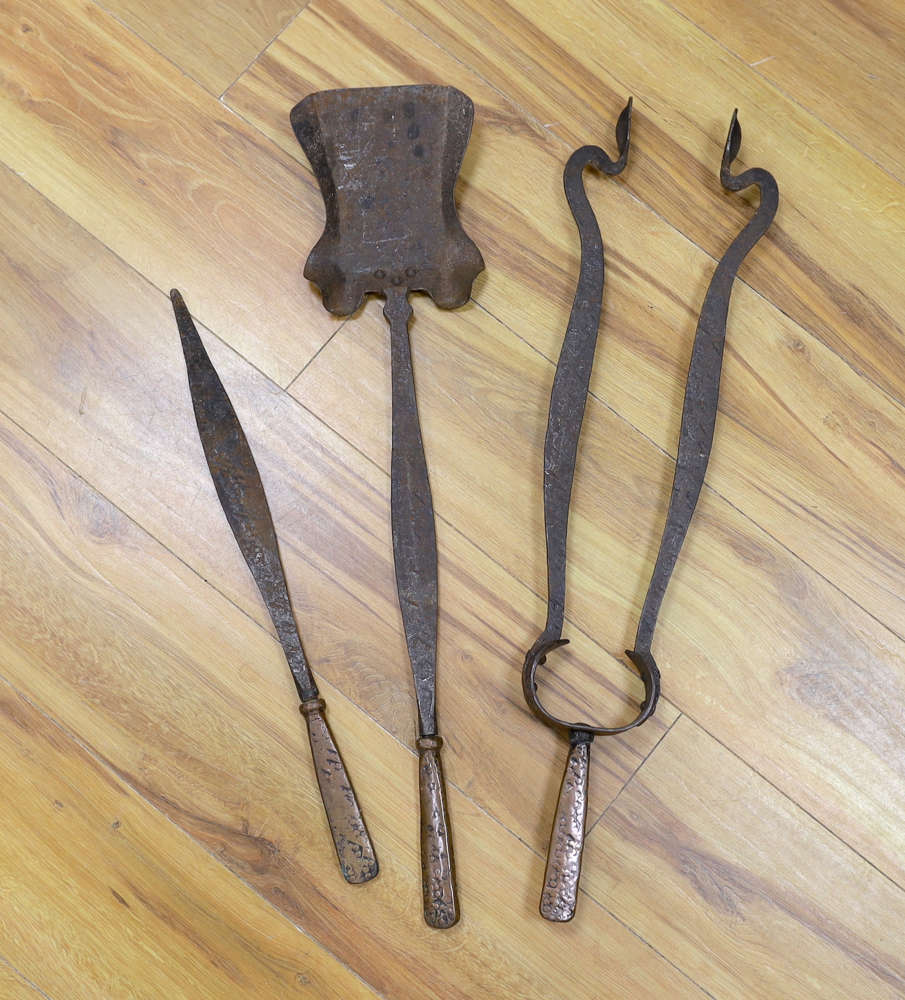 A set of Arts & Crafts fire irons